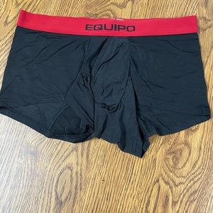 Mens worn poly spandex trunks Size M